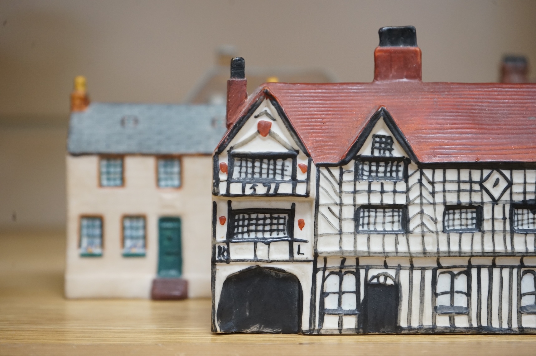 Five W.H Goss and Willow art pottery buildings, widest 14.5cm.